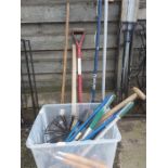 A selection of various garden hand tools.