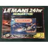 Scalextric Le Mans set together with a Meccano Hyper Space set.