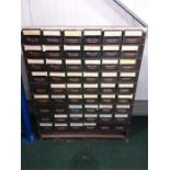 A fifty four drawer metal tool cabinet.
