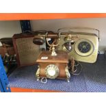 Two vintage radios and a retro style telephone.