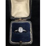 An emerald cut solitaire diamond ring set in 18ct white gold (approx. 1.75 carats). Included.