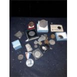 A bag of coins to include a 1935 crown 1951 crown 1937 crown, pill box charring cross hospital