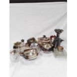 A mixed lot of Silver and silver plate to include a silver topped cologne bottle and a silver lidded