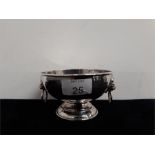 A small footed modern silver hand hammered sugar bowl with lion mask handles. maker ab (4.5"