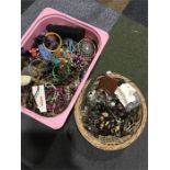 A large quantity of costume jewellery in two containers