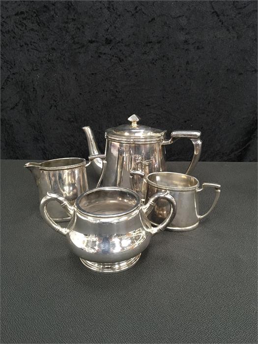 A WMF twin handled sugar bowl and a silver plated teaset.