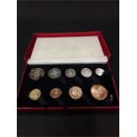 A Royal mint 1950 proof set of coins in a red box.