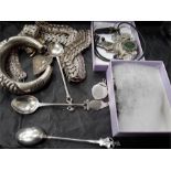 A tray of ethnic silver jewellery including bangle earrings, silver fob necklace and three silver