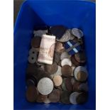 A tub of coins and medals.