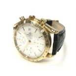 An Omega Speedmaster 18 Carat Gold Reduced Automatic Wristwatch, on black leather strap. In