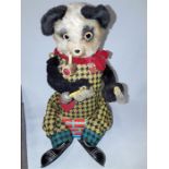 An Alps Japan battery operated tin plate panda with a wooden box of dominoes