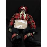 A large stuffed clown figure from the Hobo Collection.