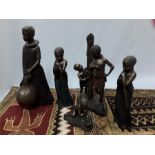 A small quantity of African resin figure collectables
