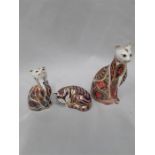 Royal Crown Derby paper weights designed as a cat with silver stopper, two with gold stoppers 3