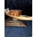 A small wooden gondola with a green jewellery box and other china, vases ,figurines etc