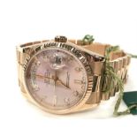 A Rolex 18 Carat Rose Gold Gent's Wristwatch: rose coloured with diamond dial, serial no. P580...