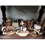 A selection of 12 ceramic collectables including mice, badger, otter and kittens