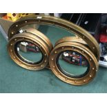 Three gilt framed mirrors