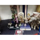 A collection of various items to include candle sticks, ornaments, an Aynsley clock etc.