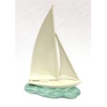 Poole Pottery racing yacht designed by John Adams glaze code C65, with unusual wall mounting boss on