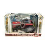 Britains No.9522 Massey Ferguson Tractor, in red and silver with driver. Appears VG, minor fatigue