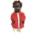 Convert and Co. (France) celluloid black doll with windmill symbol and '55' to back, with weighted