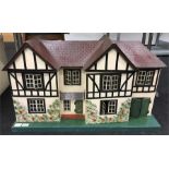 Lines Bros. Triang Tudor Style Doll's House, measures 86 x 31cm overall.