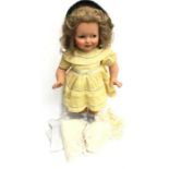 Large composition doll with flirty blue eyes, open mouth with teeth and blonde wig, height 60cm. G/