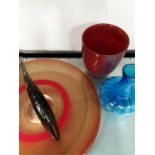 A small quantity of glassware, veninne style fish, red platter together with a blue vase (af).