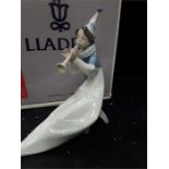 A Lladro figure entitled The Young Jester, boxed.