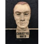 A 1950's shop display head for "Christys' Hats".