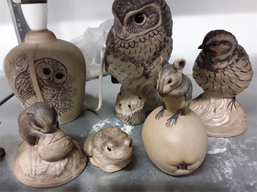 A quantity of brown Poole pottery animals. owl, mice,bird