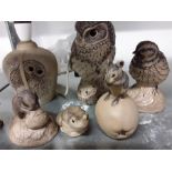 A quantity of brown Poole pottery animals. owl, mice,bird