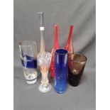 Seven large red and blue multi coloured glass vases.