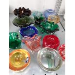 A quantity of mixed decorative glass ashtrays.