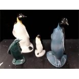 Four Poole Pottery penguins