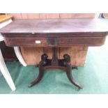 A Victorian swivel top card table.