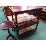 A pair of modern coffee tables and a wine table.