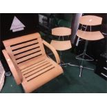 A pair of beechwood riser stools together with a armchair.