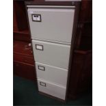 A Triumph four drawer filing cabinet.