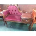 A mahogany reproduction telephone table.