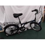 A Classic Saker folding bike. Six speed with luggage rack and mudguards.