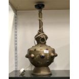 A brass eastern style lamp.