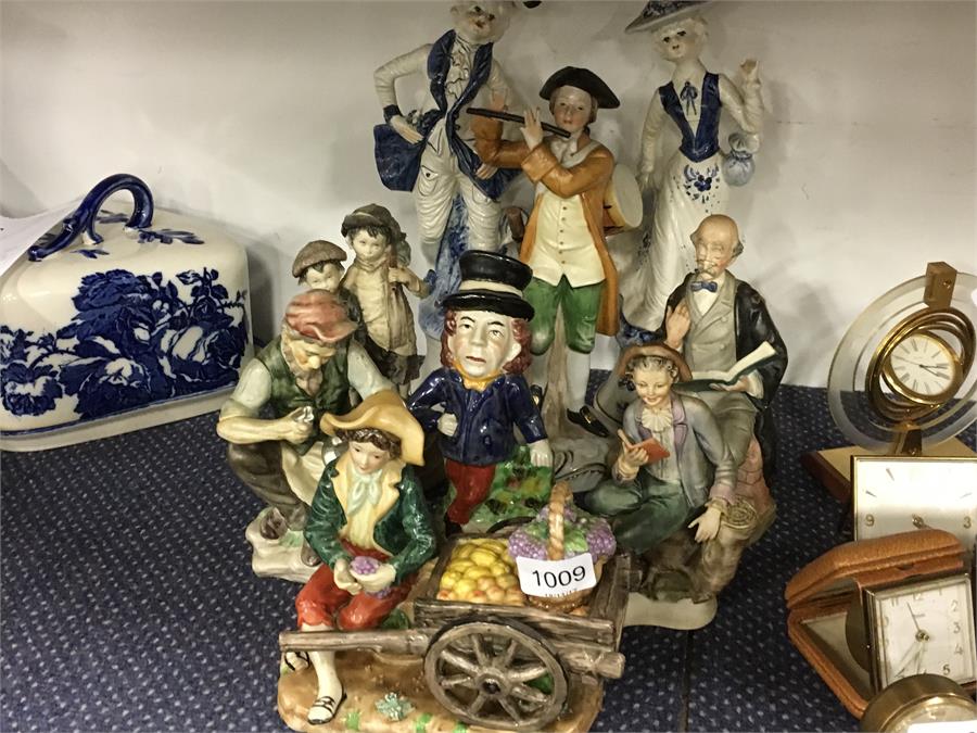 A selection of porcelain figures.