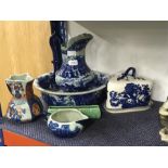 A dressing table bowl and jug set together with other china.