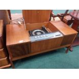 A HMV retro radiogram steriomaster in a teak cabinet.