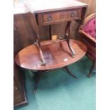 An oval mahogany occasional table together with a small sofa table.