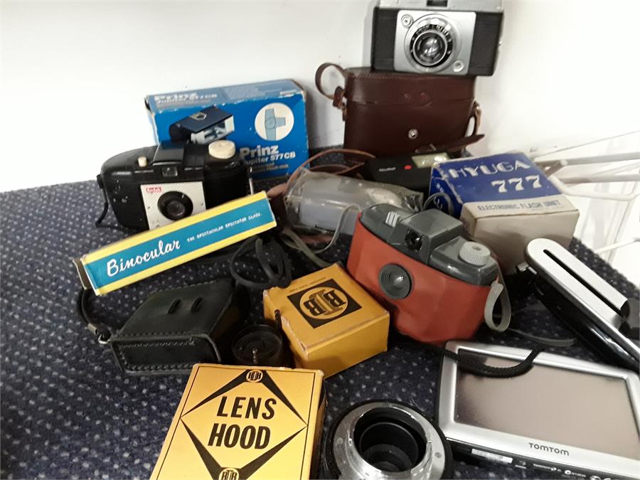 Various cameras and accessories.