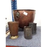 A copper jardiniere and two tankards.