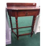 An oak hall table with a single drawer to front.